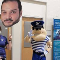louie the laker standing next to advisor Mary Nuznov